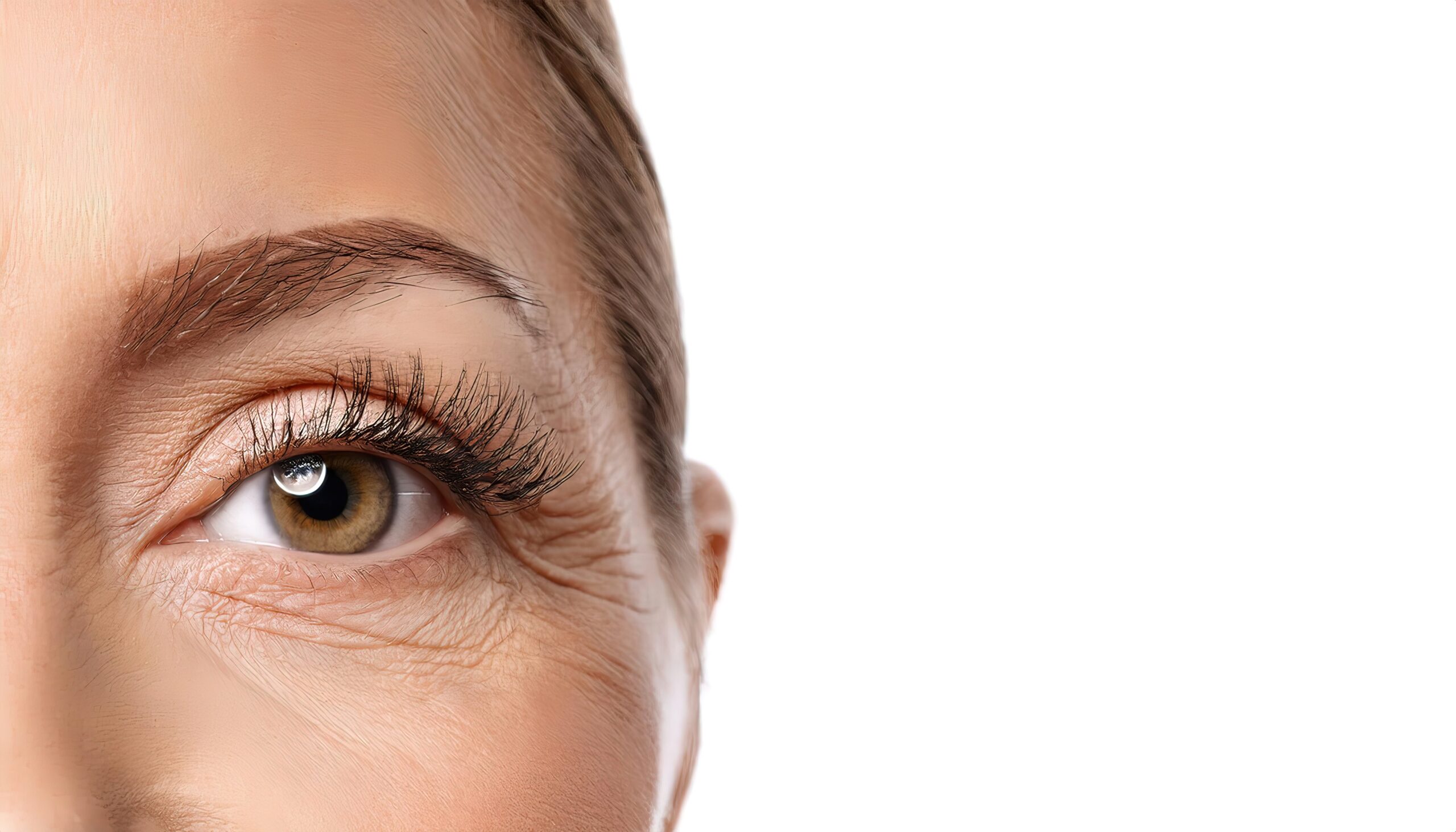 Crows feet, a name for wrinkles in the outer corner of the eyes resulting from aging, also known as lateral canthal lines, are fine lines that form on the outer corners of your eyes. Isolated on white Beautiful Woman Portrait with Full Lips and Long Eyelashes over Gray